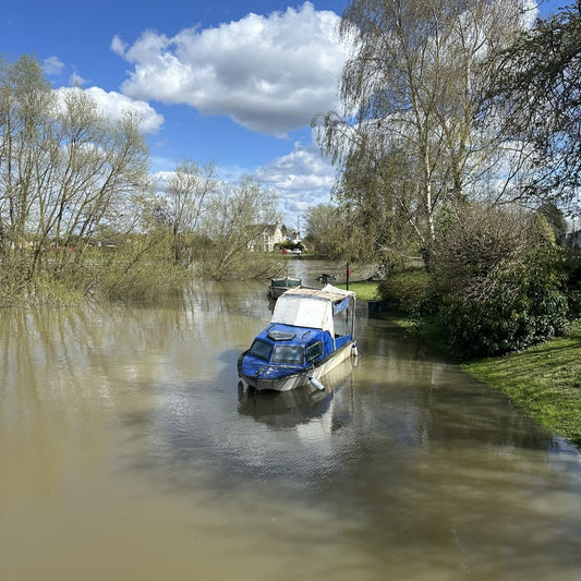 sunken illegally moored boat at Chertsey Bridge